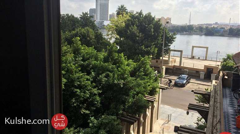 لعشاق التميز امتلك شقة بالدقى بشارع النيل ع النيل مباشرة - صورة 1