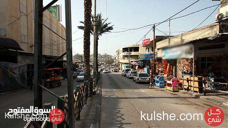 أرض في مكان ممتاز (تقع على شارع عمر المختار - غرب صيدلية عادل - مقابل بلدية - صورة 1