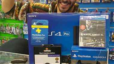 for sale new Sony PS4 Pro 1TB Console with 5 games $150usd
