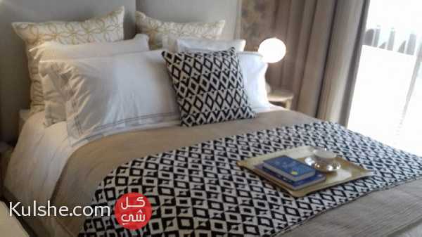 فيلا 3 غرف نوم وسط ملاعب الغولف في دبي ب 1.3 مليون درهم - صورة 1