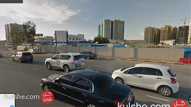 فرصة لاراضى سكنى تجارى بقلب امارة عجمان تقع ع شارع الشيخ خليفة بن زايد - صورة 1