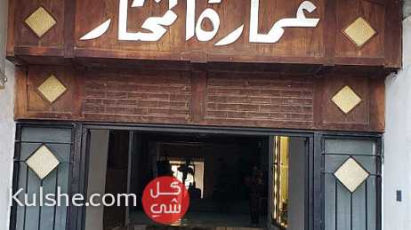 مكاتب ومحلات على شارع الكرادة ابو قلام طابق اول للايجار بـ 300 الف شهريا - صورة 1