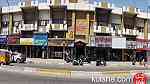 مكاتب ومحلات على شارع الكرادة ابو قلام طابق اول للايجار بـ 300 الف شهريا - Image 2
