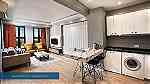 شقة للايجار اليومي والشهري في ميدان تقسيم اسطنبول غرفة نوم مع صالة - صورة 2