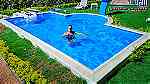حمام سباحة فيلتك فى اسرع وقت تنفيذ الاهرام للفيبر جلاس - صورة 2
