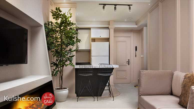 شقة فندقية من غرفتين نوم وصالة للايجار اليومي في شارع الاستقال - Image 1