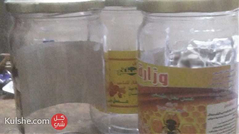 علب عسل فارغة زجاجية مستعملة للبيع - صورة 1