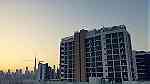 على بعد 3 كم من برج خليفة تملك شقة  عند القناة المائية ب 617 ألف درهم - Image 1