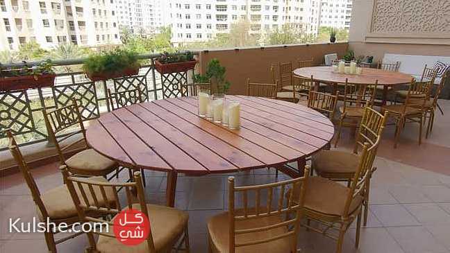 Rent Lozoya Round Wooden Dining Table for rental in Dubai. - صورة 1