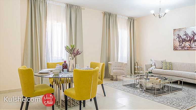 بمكان راقي في عجمان تملك شقة غرفتين وصالة بالتقسيط المريح ل7 سنوات - صورة 1