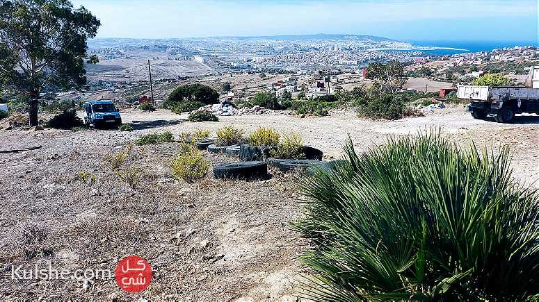 قطعة أرضية بمنظر بانورامي صالحة للبناء بمنطقة الشجيرات في طنجة - صورة 1