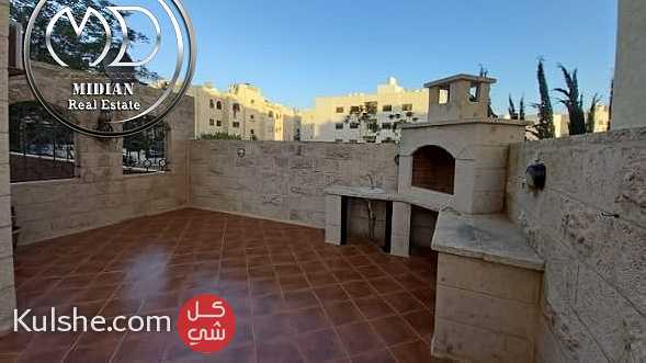 شقة شبه ارضي فارغة للايجار الدوار السابع 190م مع ترس و حديقة 100م - Image 1