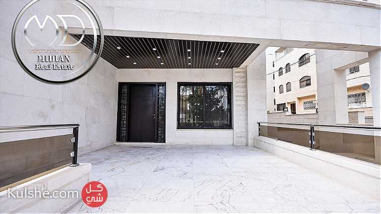 شقة ارضية جديدة للبيع ضاحية الامير راشد 235م مع ترس 50م - Image 1