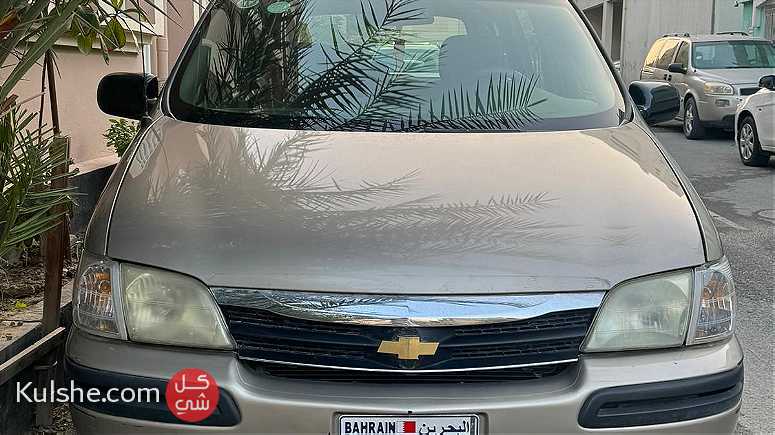 Gold Chevrolet car for sale - Image 1