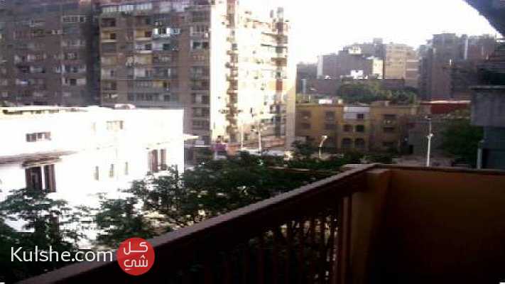 شقة للبيع بالدقي تطل على شارع التحرير ... - صورة 1